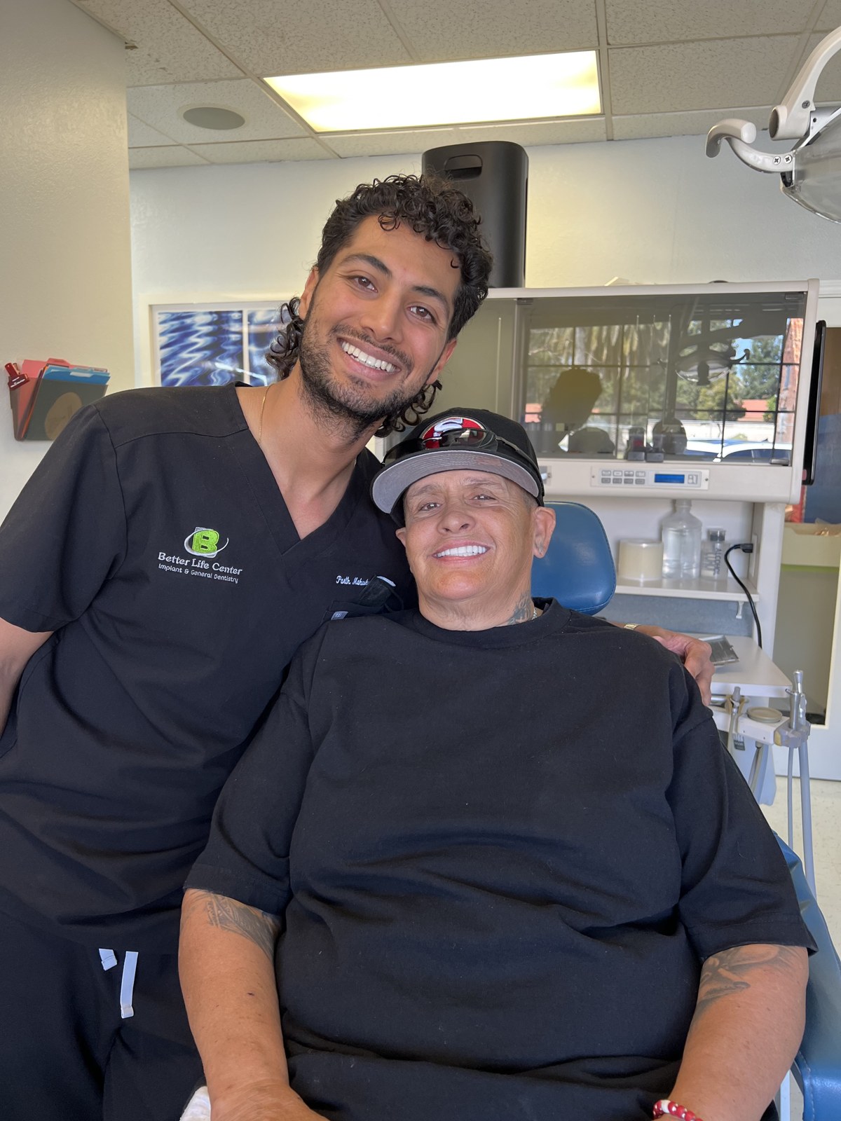 Dr. Parth Maheshwari with the sales professional treated with minimal-prep veneers